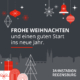 Dort sind die Frohe Weihnachtswünsche des Jahnstations Regensburg Team zu lesen. Umrahmt werden sie von Weihnachtsdeko.